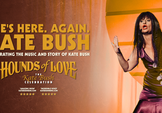 Woman resembling Kate Bush poses expressively.