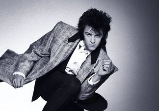 Black and white image of Paul Young.