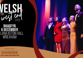 Five people stood on a stage, preparing to take a bow.