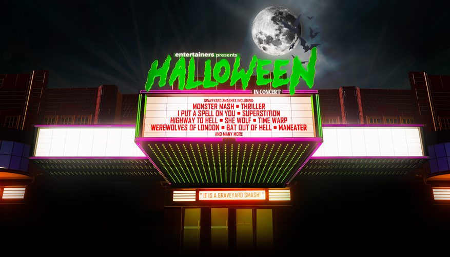 Outdoors of an old cinema building with show title.