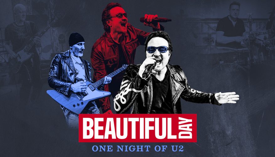 Lead singer performing with a microphone and band members playing instruments.